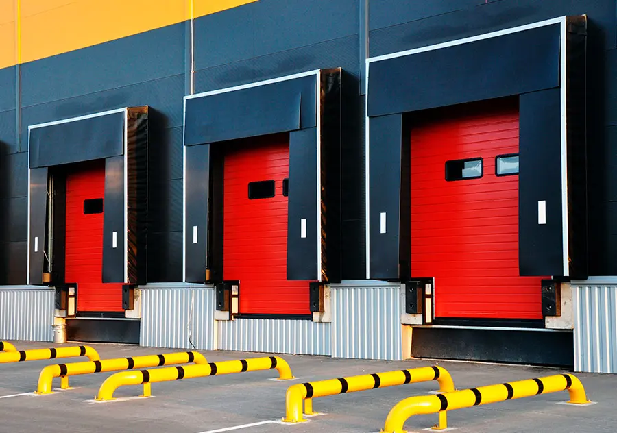 Four red loading dock doors Four red loading dock doors